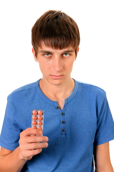 錠剤と若い男 — ストック写真