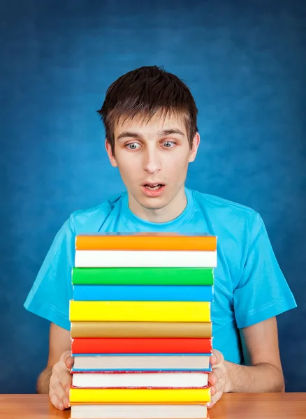 Joven con los libros — Foto de Stock