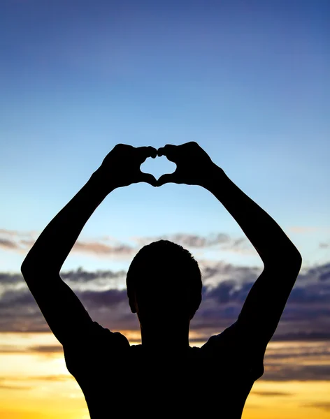 Silhueta homem no pôr do sol — Fotografia de Stock