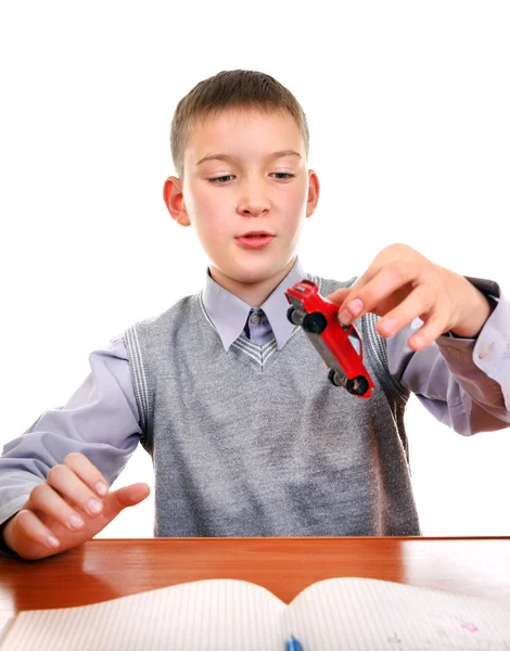 Schoolboy plays with a Toy — Stock Photo, Image