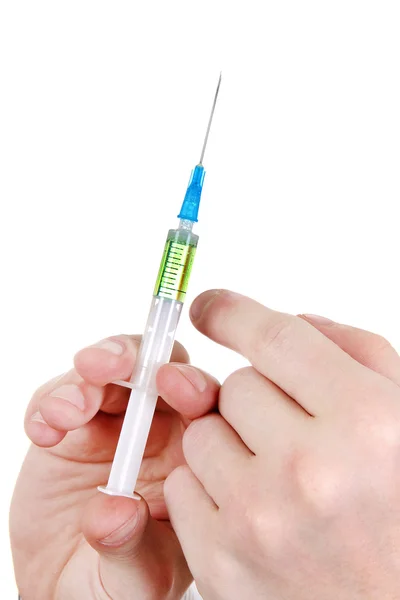 Syringe in a Hand — Stock Photo, Image