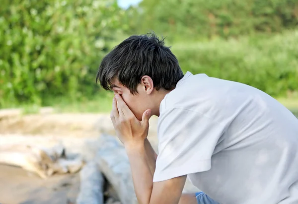 Triest jonge man — Stockfoto