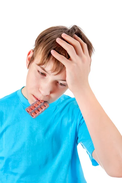 Niño con las píldoras — Foto de Stock