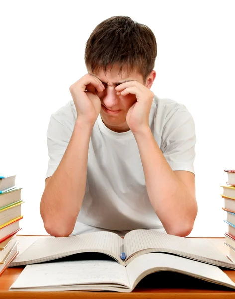 Estudante cansado com os livros — Fotografia de Stock