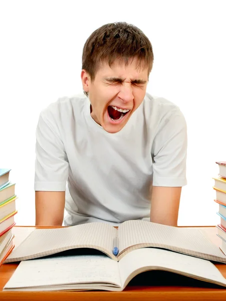 Estudante cansado com os livros — Fotografia de Stock