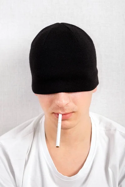 Young Man Hat Cigarette White Wall Closeup — Stock Photo, Image