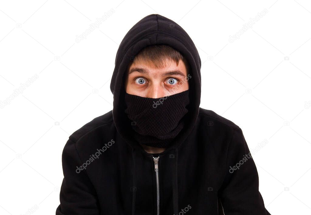 Shocked Young Man in a Mask Isolated on the White Background