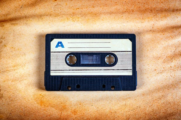 Cassette Audio Sul Vecchio Sfondo Carta Primo Piano — Foto Stock