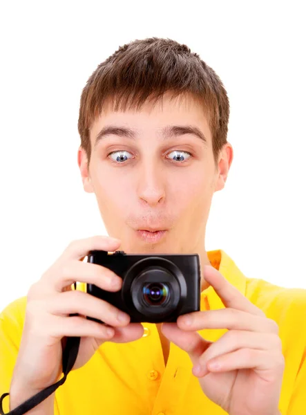 Chico Sorprendido Con Una Cámara Fotográfica Fondo Blanco — Foto de Stock