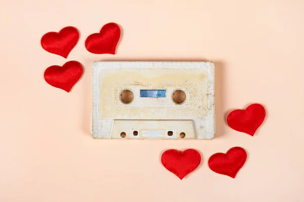 Old Audio Cassette Red Hearts Paper Background Closeup — Stock Photo, Image