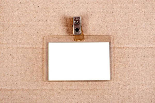 Blank Badge Auf Dem Karton Hintergrund Nahaufnahme — Stockfoto