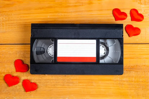 Retro Video Tape Cassette Red Hearts Wooden Planks Background — Φωτογραφία Αρχείου