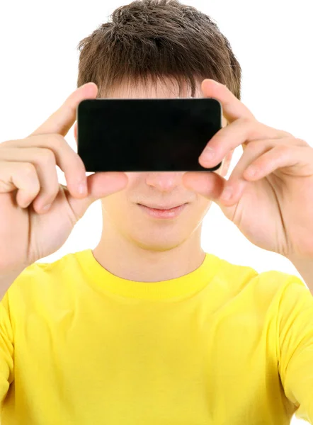 Teenager Machen Ein Foto Mit Einem Handy Auf Weißem Hintergrund — Stockfoto