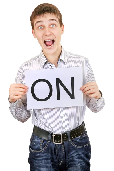 Cheerful Teenager hold slogan ON — Stock Photo, Image