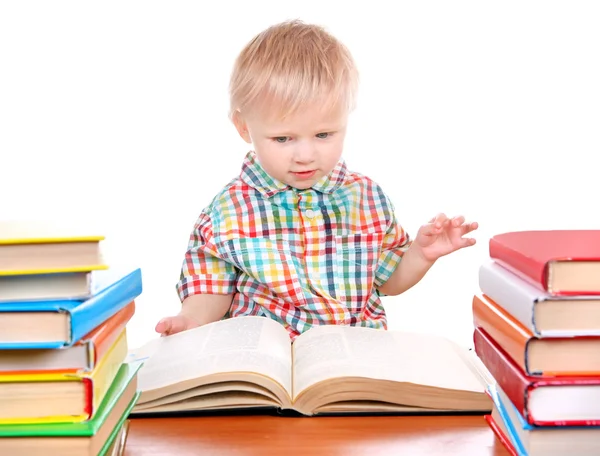 Мальчик с книжками — стоковое фото