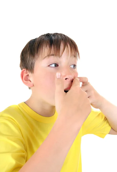 Niño con espinilla — Foto de Stock