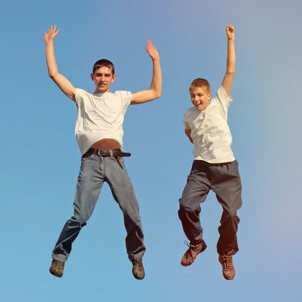 Tennage Boys jumping Royalty Free Stock Images