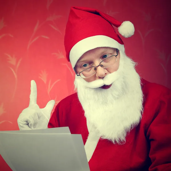 Santa Claus reads a Letter — Stock Photo, Image