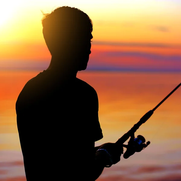 Fisher man silhouet — Stockfoto
