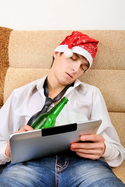 Teenager sleeping with a Beer and Tablet — Stock Photo, Image