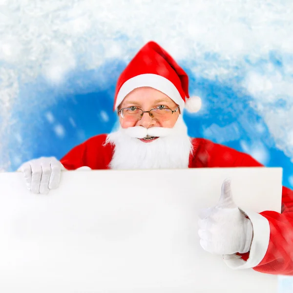 Papai Noel com placa em branco — Fotografia de Stock
