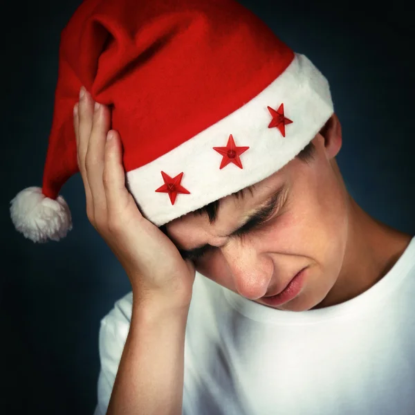 Επώδυνη έφηβος στο Santa καπέλο — Φωτογραφία Αρχείου