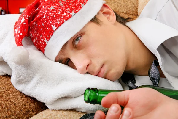 Drunken Teenager in Santa Hat — Stock Photo, Image