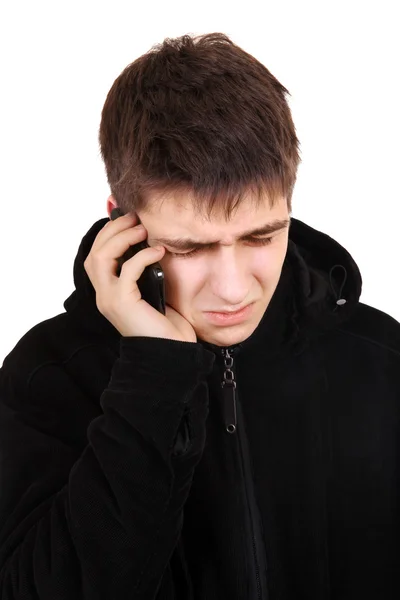 Joven triste con teléfono celular — Foto de Stock