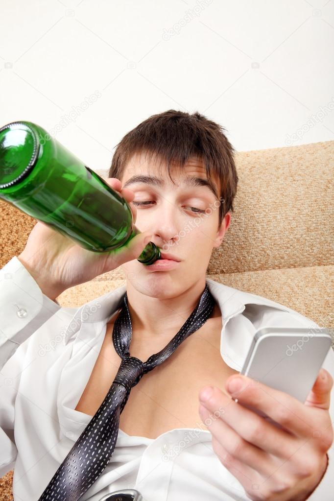 Teenager with a Beer and Cellphone