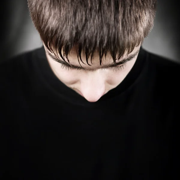 Young Man with lowered Head — Stock Photo, Image