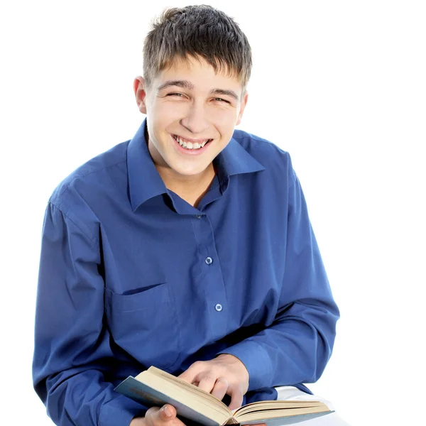 Adolescente feliz com um livro — Fotografia de Stock