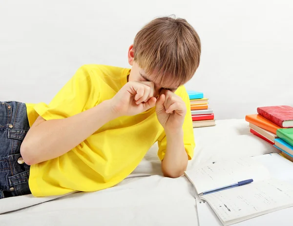 Tired Teenager doing Homework — Stock Photo, Image