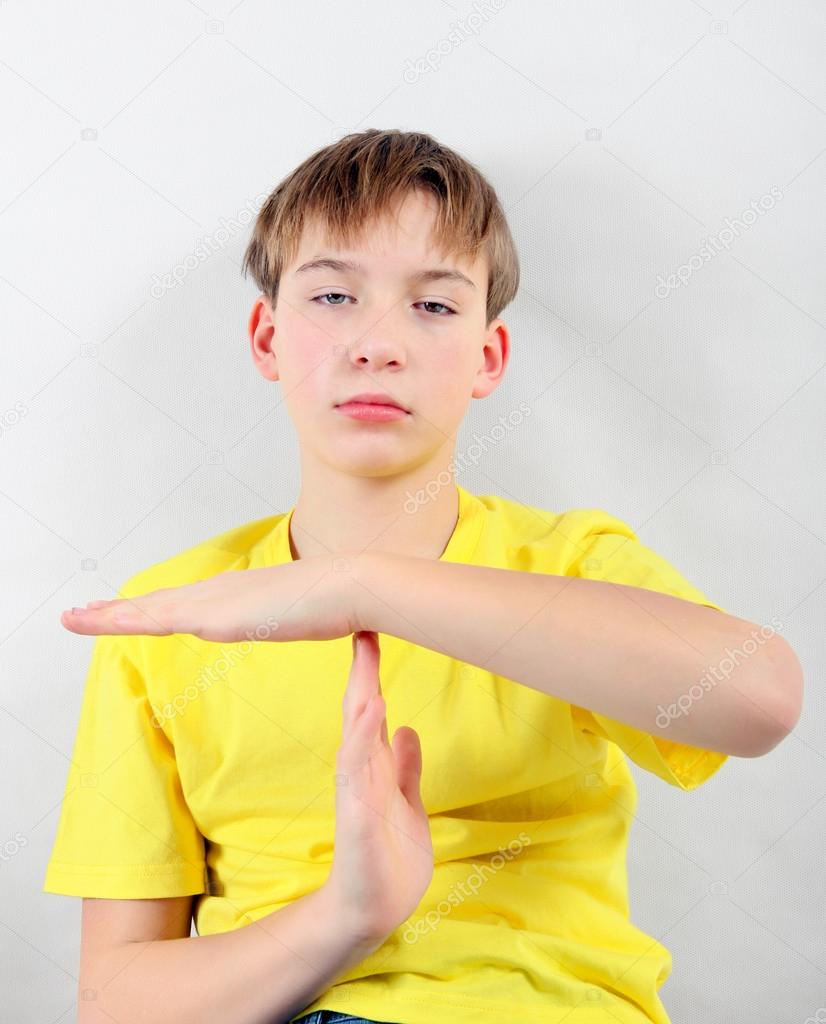 Tired Kid with Time-out Gesture