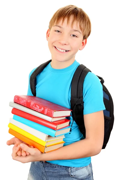 Schooljongen met een boeken — Stockfoto