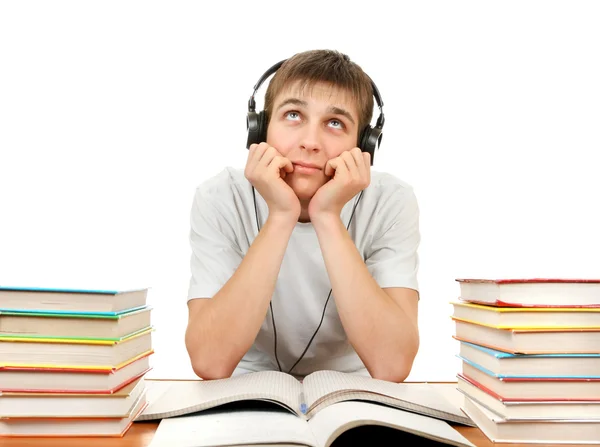 Uttråkad Student i hörlurar — Stockfoto
