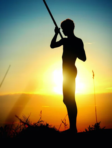 Fisher em um pôr do sol — Fotografia de Stock