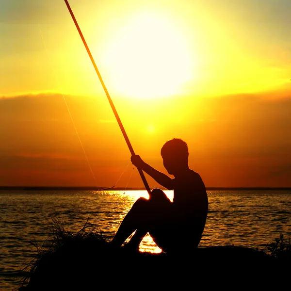 Silhouette del pescatore — Foto Stock