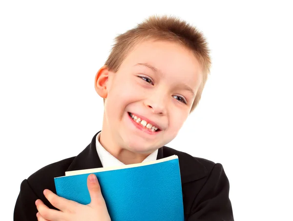 Ragazzo felice con libro di esercizi — Foto Stock