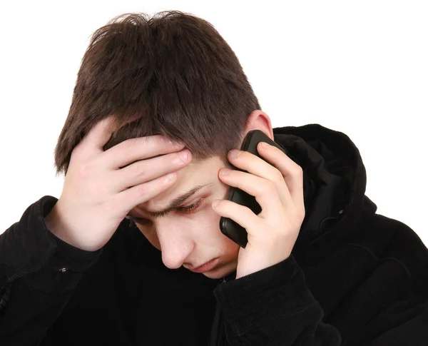 Adolescente estressado com o telefone — Fotografia de Stock