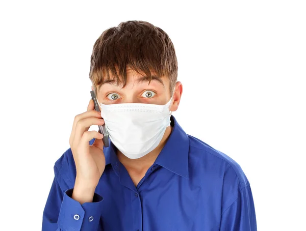 Підліток у масці грипу — стокове фото