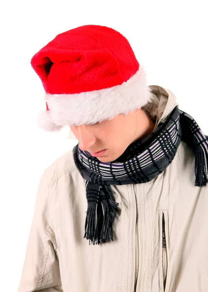 Sad Young Man in Kerstman hoed — Stockfoto