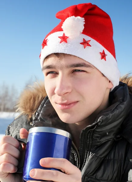 Tonåring i santa hatt — Stockfoto