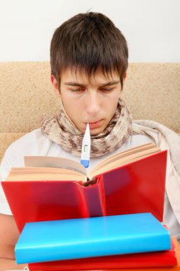 Termometre ile hasta genç adam