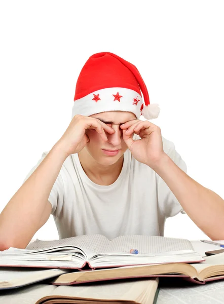 Κουρασμένος φοιτητής στο Santa καπέλο — Φωτογραφία Αρχείου