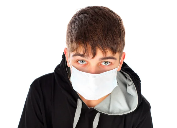 Tiener in griep masker — Stockfoto