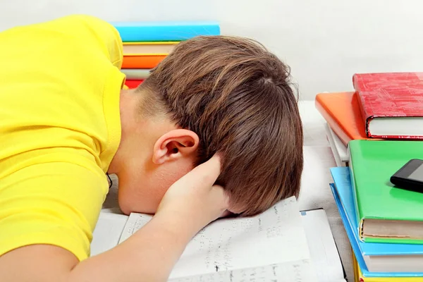 Criança cansada e lição de casa — Fotografia de Stock