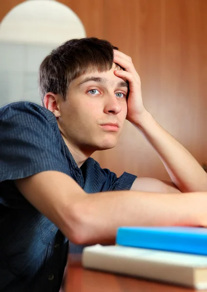Sad Young Man with the Books — Stock Photo, Image