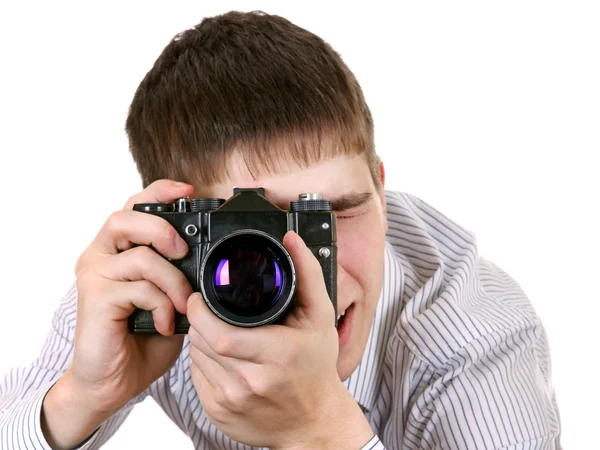 Jongeman met fotocamera — Stockfoto