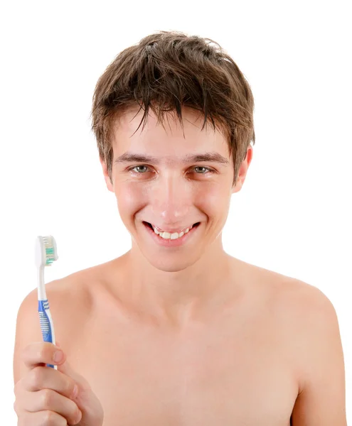 Молодий чоловік з зубною щіткою — стокове фото