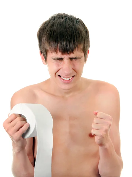 Ung Man med toalettpapper — Stockfoto